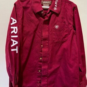 2 Ariat long sleeve button down shirts sold together.